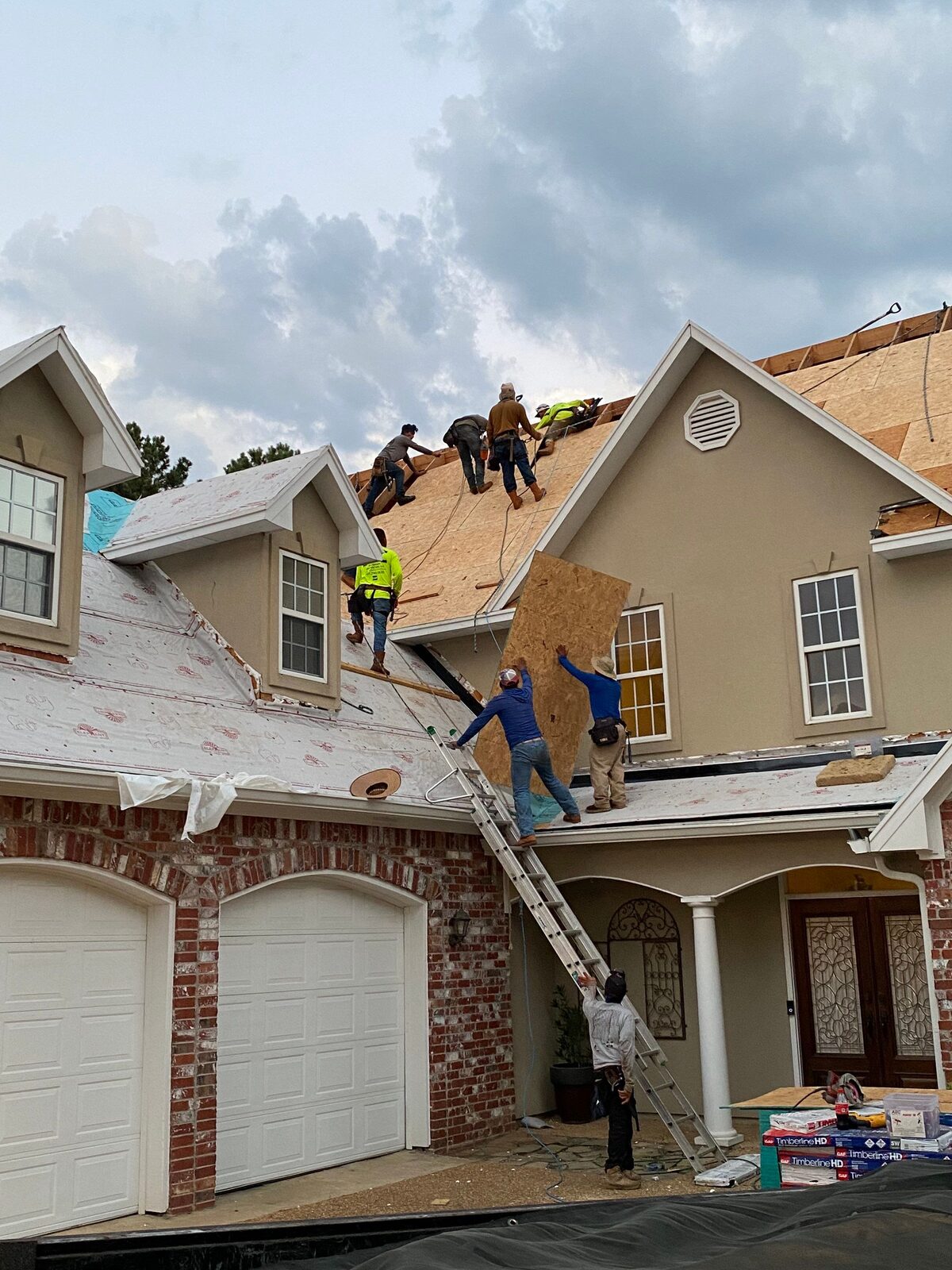 Dickerson crew working a residential roof mid-install