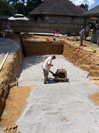 Excavator digging the pool