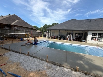 Concrete pool deck being poured