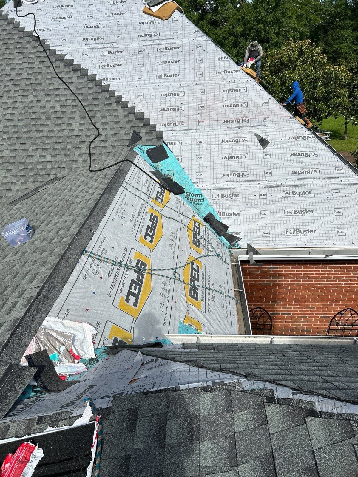 Dickerson crew working a steep roof line