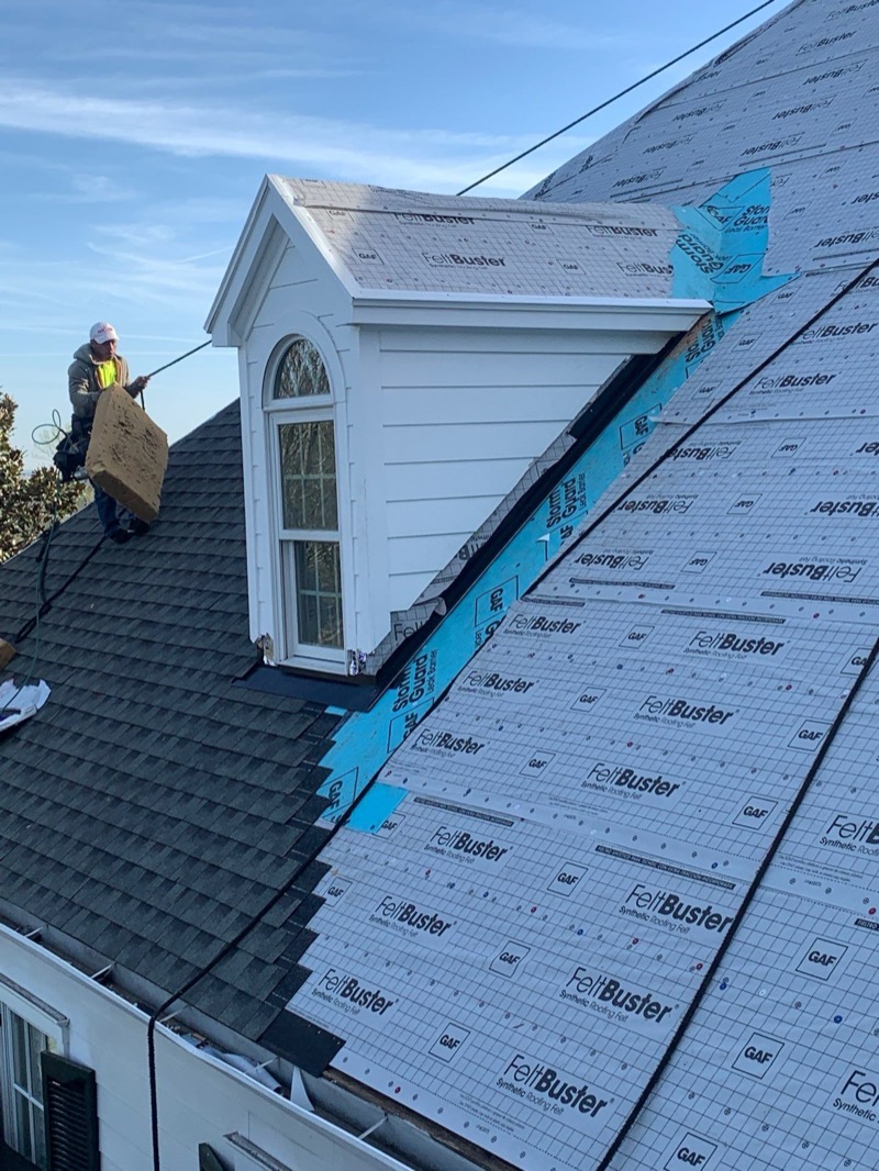 Dormers mid install with fresh underlayment on the roof